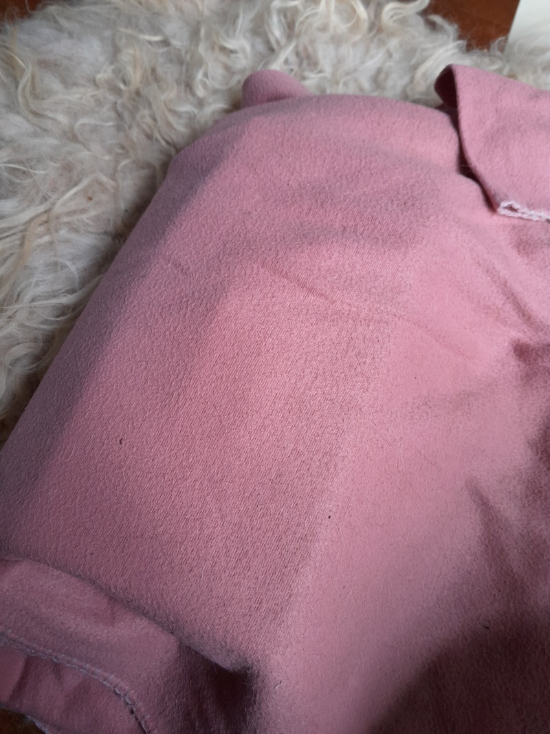 fleece blanket folded left to right over the cardboard