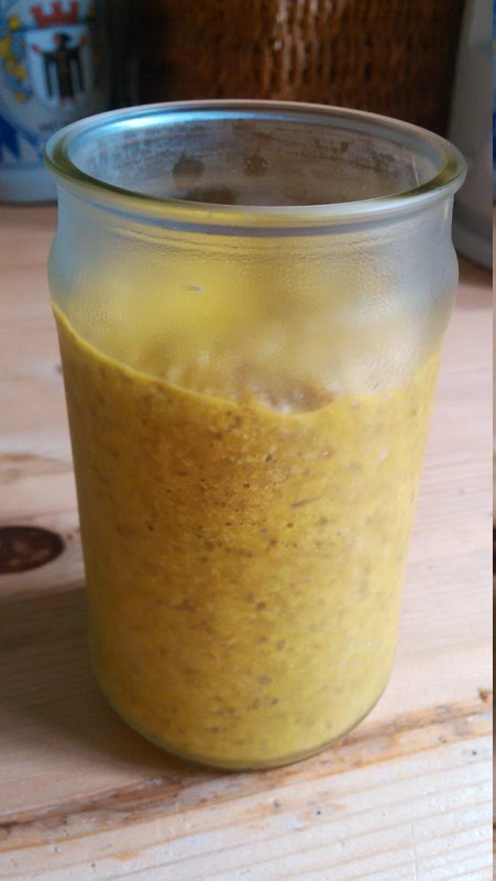 a musterd glass full of home made mustard